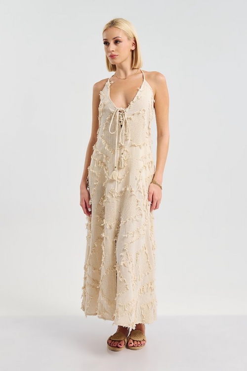 Long backless dress with decorative tassels